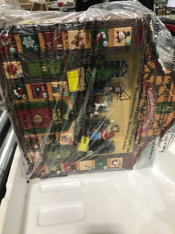 Photo 2 of Christmas Decor Animated Advent Calendar House, Christmas Tabletop Decor with LED Lights and Christmas Music - Power Adapter (included) (16.2"H x 15.4"W x 3.7"D) BO, 3 AA batteries not included.