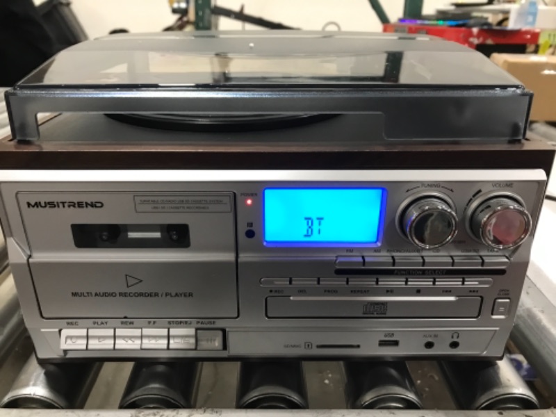 Photo 1 of MUSITREND 10 in 1 Record Player with External Speakers,3 Speed Bluetooth Turntable Vinyl Player with CD/Cassette Play,AM/FM Radio, USB/SD Encoding,Aux-in/RCA Line Out Silver