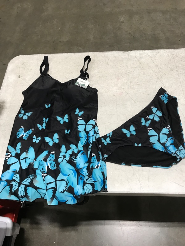 Photo 1 of Black and blue two piece swimsuit with butterfly graphic 