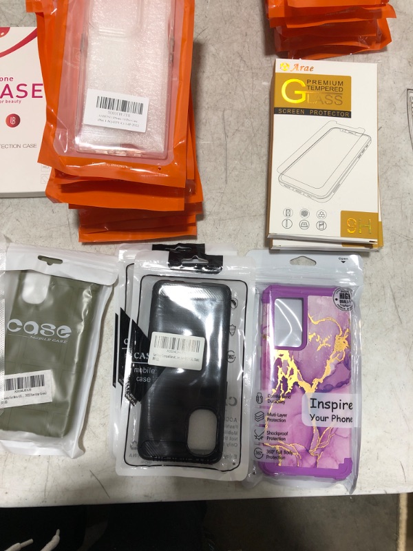 Photo 5 of Large box lot of phone cases, smart watch bands, tablet cases, screen protectors, etc. All brand new. Various styles and compatibilities. Sold as is.