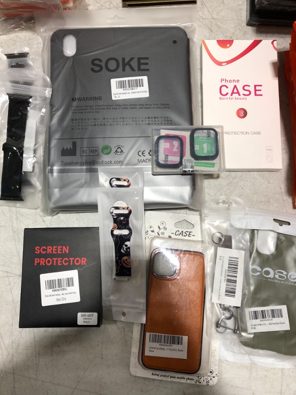 Photo 2 of Large box lot of phone cases, smart watch bands, tablet cases, screen protectors, etc. All brand new. Various styles and compatibilities. Sold as is.