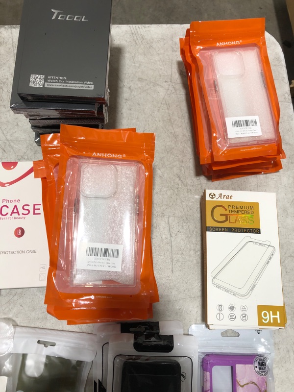 Photo 4 of Large box lot of phone cases, smart watch bands, tablet cases, screen protectors, etc. All brand new. Various styles and compatibilities. Sold as is.