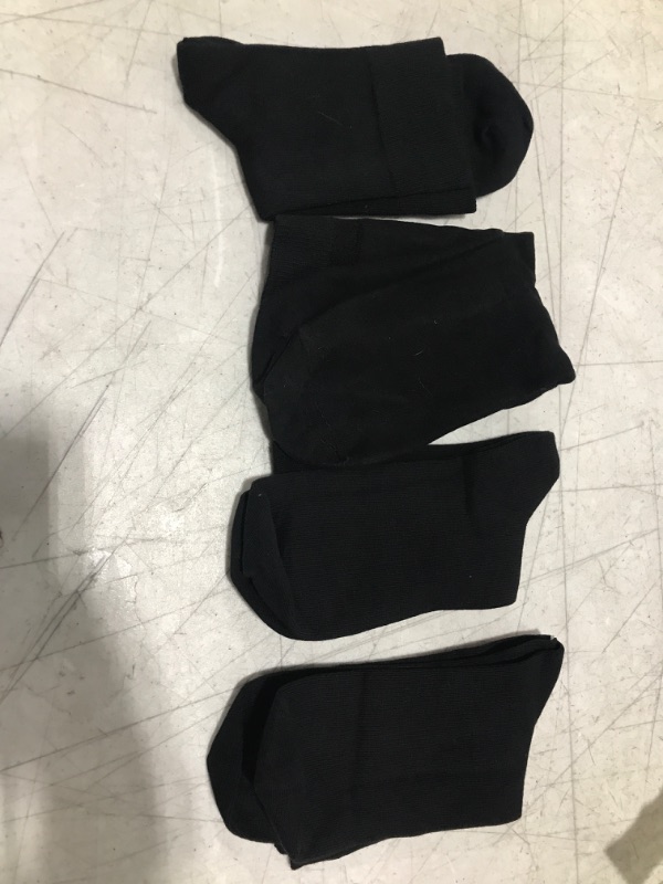 Photo 1 of 4 pairs black long socks 