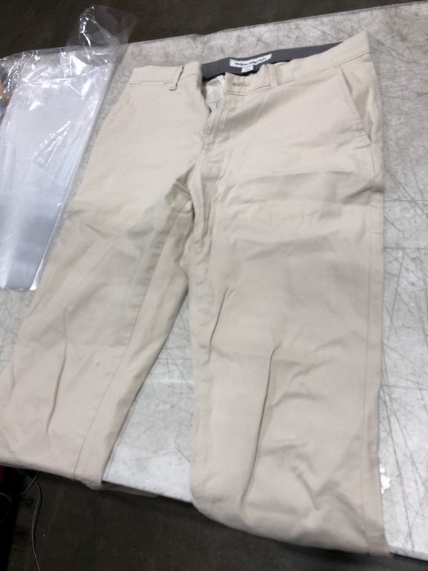 Photo 1 of Amazon Essentials Size 31Wx30L cream colored pants 