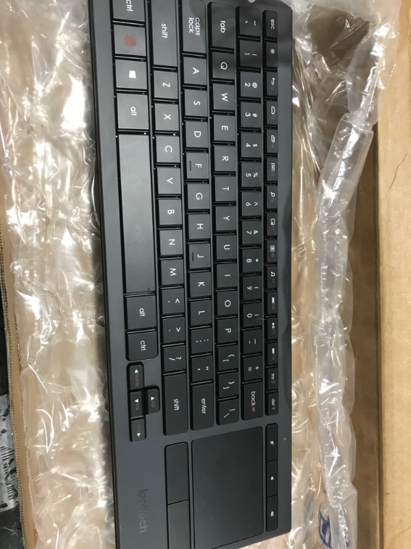 Photo 1 of logitech wireless keyboard with mouse pad built in