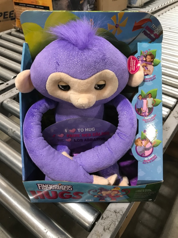 Photo 2 of Fingerlings HUGS - Kiki - Advanced Interactive Plush Baby Monkey Pet - by WowWee (Amazon Exclusive)