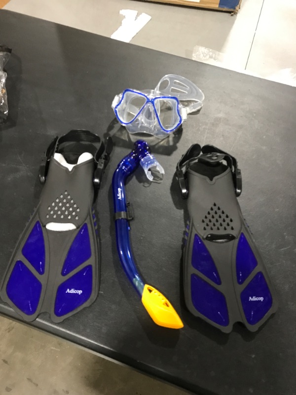 Photo 2 of Kids Mask Fin Snorkel Set for 3-7 Years Old Boys and Girls with Panoramic Snorkel Mask Diving Goggles Dry Top Snorkel and Adjustable Fins for Snorkeling Swimming Freediving Blue