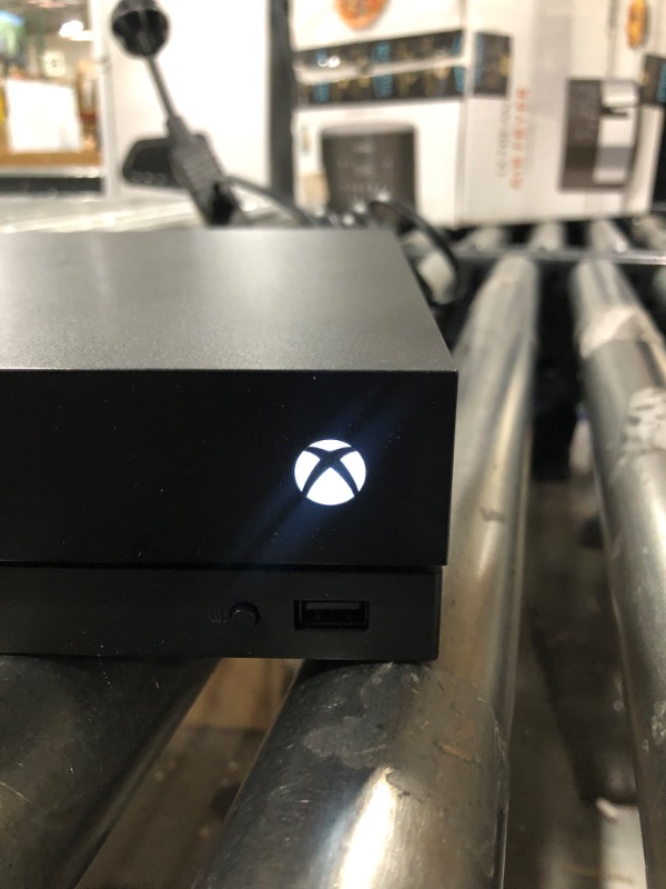 Photo 1 of Microsoft Xbox One X 1TB Console - Black