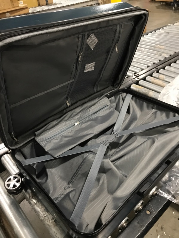 Photo 1 of AMAZONBASICS HARD SHELL CARRY ON SPINNER SUITCASE LUGGAGE - 24 INCH, NAVY BLUE