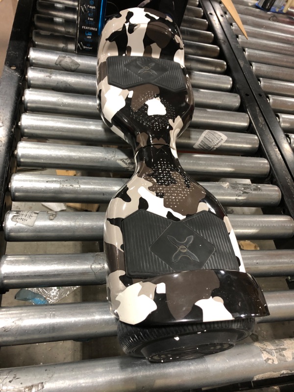 Photo 1 of Hover-1 Helix Electric Hoverboard | 7MPH Top Speed, 4 Mile Range, 6HR Full-Charge, Built-in Bluetooth Speaker, Rider Modes: Beginner to Expert Hoverboard Camo