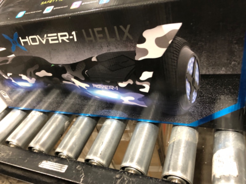 Photo 1 of Hover-1 Helix Electric Hoverboard | 7MPH Top Speed, 4 Mile Range, 6HR Full-Charge, Built-in Bluetooth Speaker, Rider Modes: Beginner to Expert Hoverboard Camo