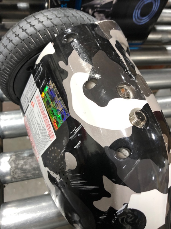 Photo 1 of Hover-1 Helix Electric Hoverboard | 7MPH Top Speed, 4 Mile Range, 6HR Full-Charge, Built-in Bluetooth Speaker, Rider Modes: Beginner to Expert Hoverboard Camo