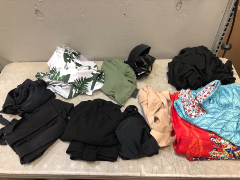 Photo 1 of BAG LOT, MISC. WOMENS CLOTHING ITEMS, SIZES MAY VARY(BUY AS IS)