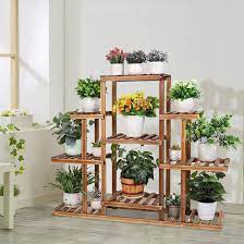 Photo 1 of (STOCK PHOTO IS JUST AN EXAMPLE, ACTUAL ITEM MAY DIFFER) WOODEN TIERED PLANT STAND (BOX IS DAMAGED)