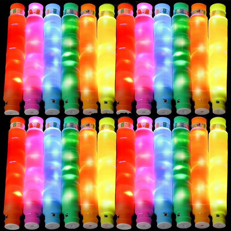 Photo 1 of 24 Packs Light Up Pop Fidget Tubes Party Favors for Kids, Large Glow Sticks Glow in The Dark Party Supplies Goodie Bag Stuffers Sensory Toys Birthday Gift for Kids/Adults
