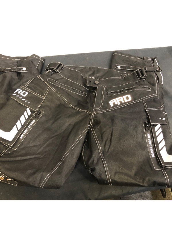 Photo 1 of MOTORCYCLE PANTS, BLACK WITH REFLECTIVE SILVER DETAILS. SIZE 30 