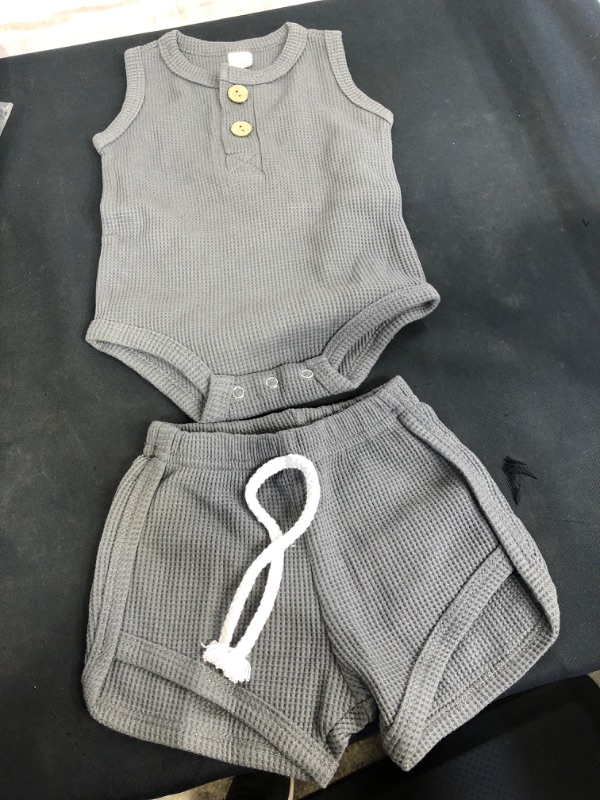 Photo 1 of GREY WAFFLE MATERIAL 2PC SET FOR BABY, SIZE APPEARS TO BE 3-6 MOS 