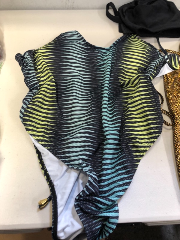 Photo 2 of BAG LOT OF WOMENS SWIMWEAR ITEMS SIZE L ---SOLD AS IS ----