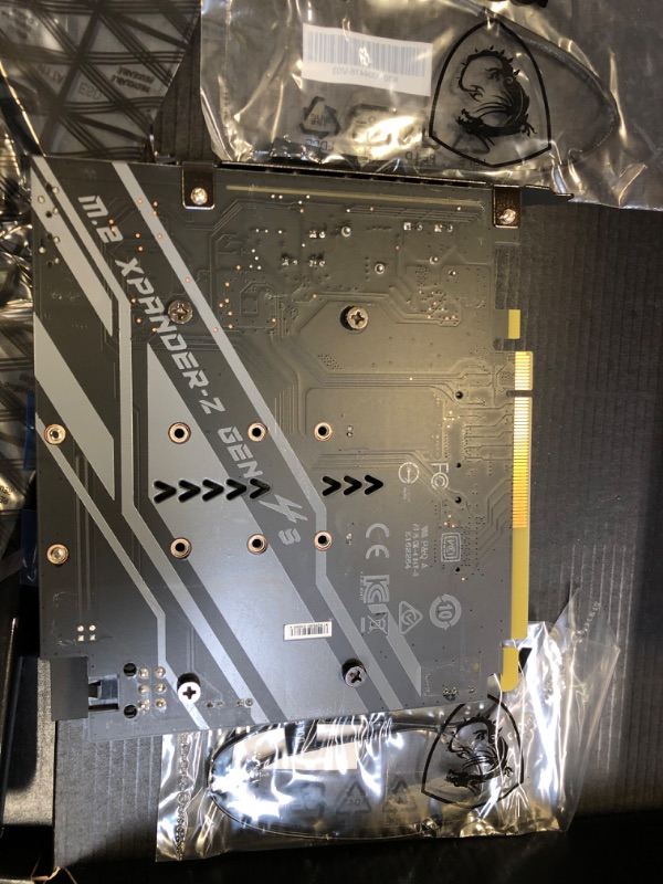 Photo 11 of MSI MEG Z490 GODLIKE Gaming Motherboard (E-ATX, 10th Gen Intel Core, LGA 1200 Socket, DDR4, SLI/CF, Triple M.2 Slots, Thunderbolt 3 Type-C, Wi-Fi 6, Mystic Light RGB) DAMAGED PIN BOTTOM RIGHT/ DAMAGED / DAMAGED / DAMAGED / DAMAGED / USED FOR PARTS ONLY 

