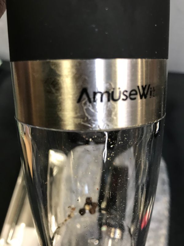 Photo 1 of Gravity Electric Salt and Pepper Grinder Set of 2 - Battery Operated Automatic Salt and Pepper Mills with White Light -- COULD NOT FULLY TEST