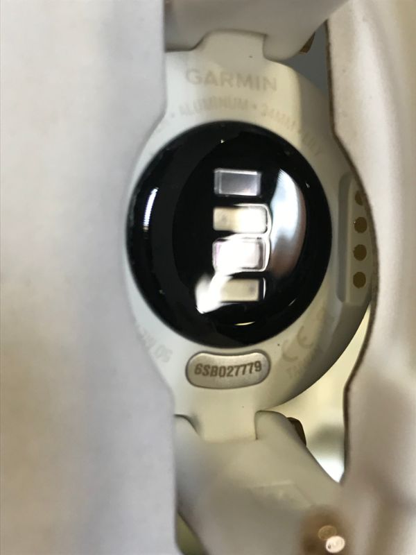 Photo 2 of Garmin Lily™, Small GPS Smartwatch with Touchscreen and Patterned Lens, Light Gold and White
