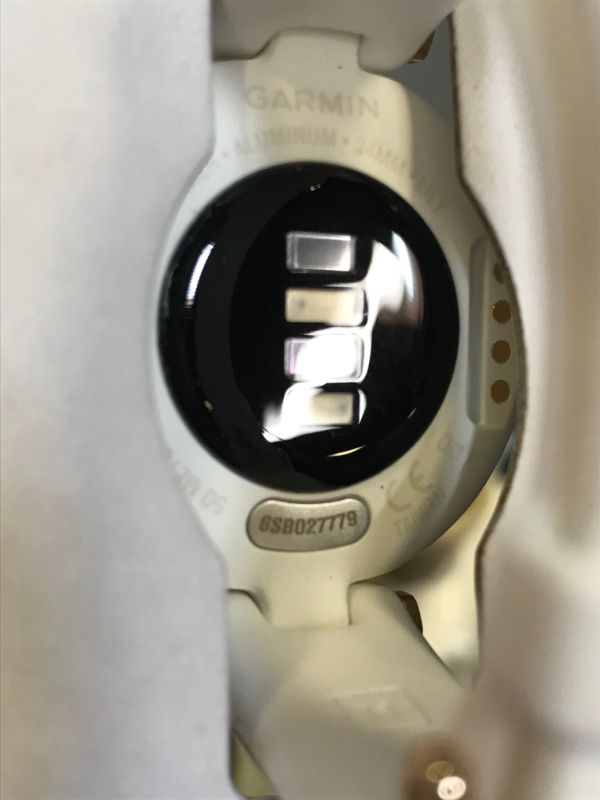 Photo 4 of Garmin Lily™, Small GPS Smartwatch with Touchscreen and Patterned Lens, Light Gold and White
