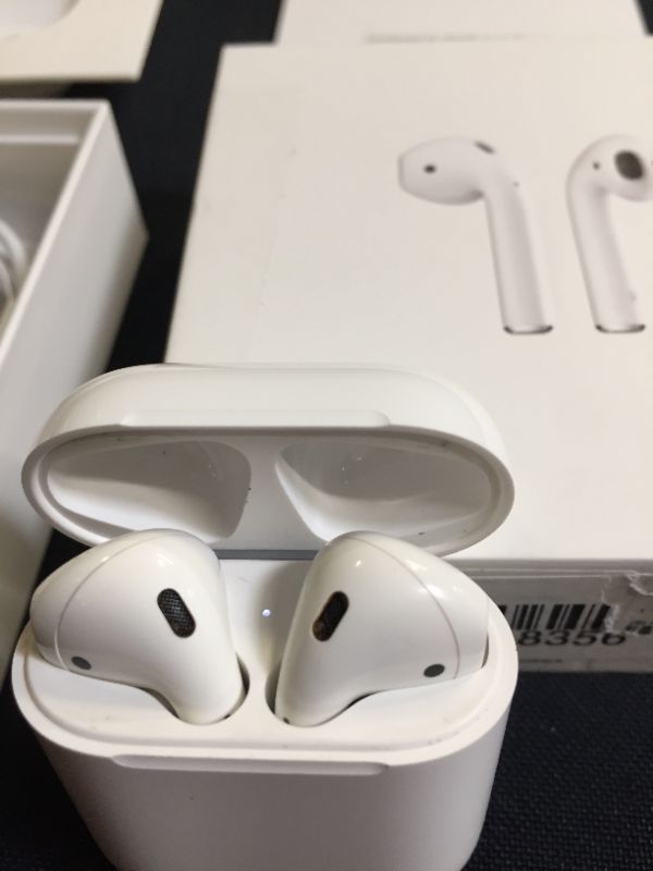 Photo 3 of Apple AirPods (2nd Generation) Wireless Earbuds with Lightning Charging Case Included.