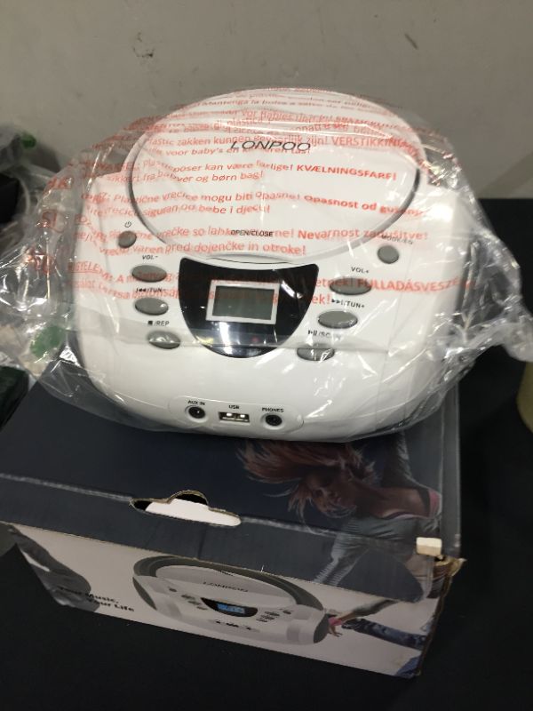 Photo 2 of LONPOO CD Player Portable Boombox with FM Radio/USB/Bluetooth/AUX Input and Earphone Jack Output