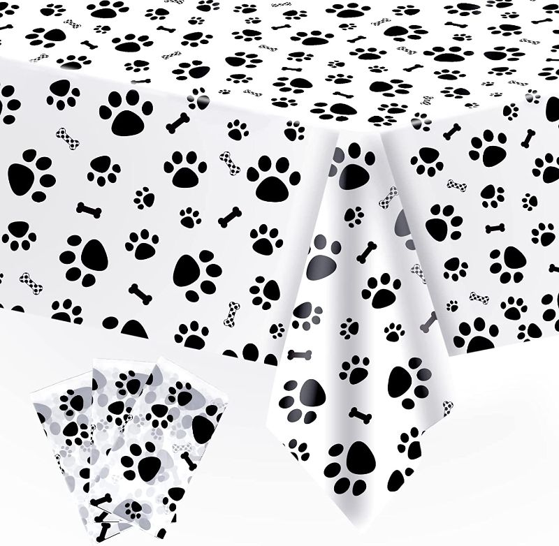 Photo 1 of 3 Pack Puppy Dog Pet Paw Print Plastic Tablecloth Table Cover,Large Paw Print and Bone Sign Plastic Disposable Rectangle Table Cover for Pet Dog Themed Birthday Party Decorations,54x108 inch
