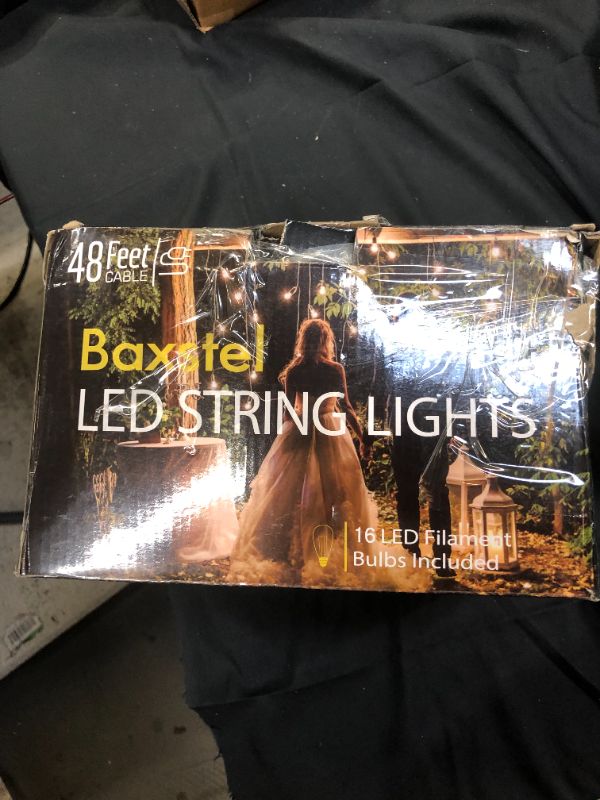 Photo 1 of Baxstel LED Outdoor String Lights 48Ft with Dimmable Edison Vintage Shatterproof Bulbs and Commercial Grade Weatherproof Strand Heavy-Duty Decorative Cafe, Patio, Market Light

