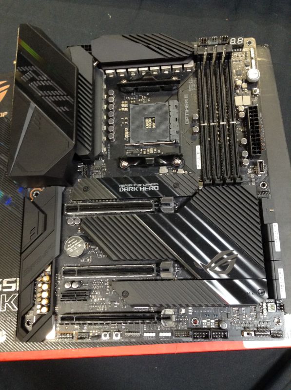 Photo 2 of ASUS ROG Crosshair VIII Dark Hero AMD AM4 X570S Zen 3 Ryzen 5000 & 3rd Gen Ryzen ATX Gaming Motherboard (PCIe 4.0, 14+2 Ti Power Stages, PCH Heatsink, Wi-Fi 6, 2.5 Gbps LAN, USB 3.2 Gen 2 Type-C - ITEM IS DIRTY -