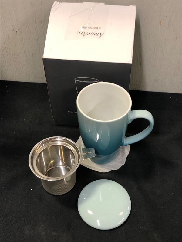 Photo 2 of AmorArc Porcelain Tea Mug,19Oz Tea Cup with Infuser and Lid, Tea Strainer Cups with Tea Bag Holder for Loose Leaf Tea, Tea Steeping Mug with well-wrapped Gift box- Gradient Turquoise
