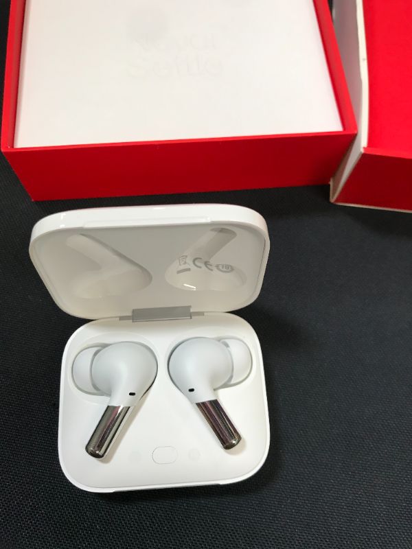 Photo 2 of OnePlus Buds Pro True Wireless Earbuds White, Smart Active Noise Cancelling, Wireless Charging Case Included, , Dual Connection, 38 Hour Playtime, Fast Charging, Water Resistant, Glossy White
