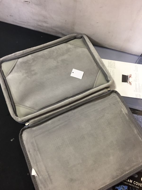 Photo 1 of laptop case and cover (size unknown)