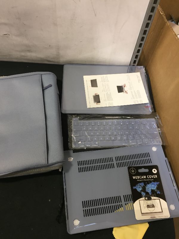 Photo 1 of laptop case and cover (size unknown)