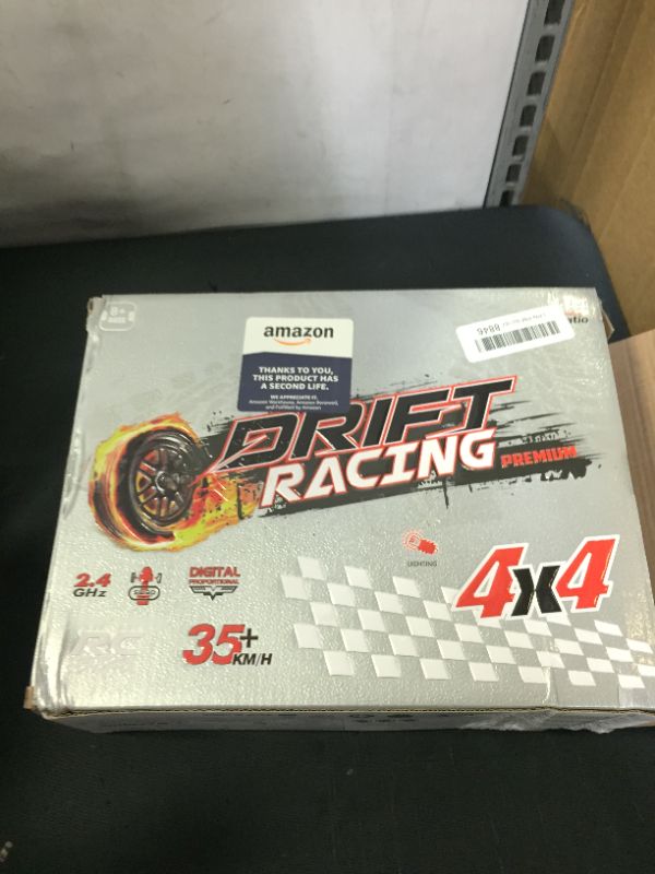 Photo 1 of DRIFT CAR REMOTE CONTROL 
(NEEDS BATTERIES)(UNABLE TO TEST)