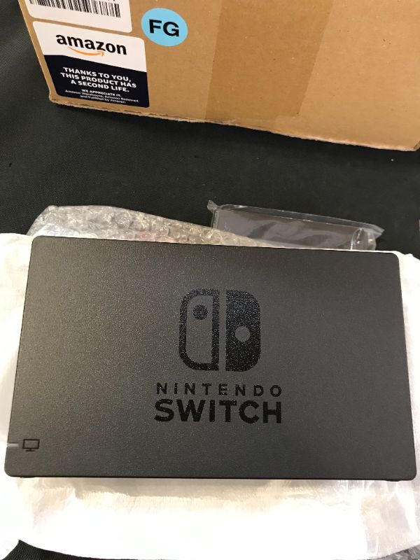 Photo 7 of Nintendo Switch with Neon Blue and Neon Red Joy Con --- RENEWED 
