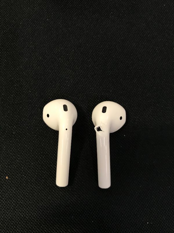 Photo 5 of Apple AirPods (2nd Generation) Wireless Earbuds with Lightning Charging Case Included. Over 24 Hours of Battery Life, Effortless Setup. Bluetooth Headphones for iPhone --- FULLY FUNCTIONAL BUT DENT IN RIGHT AIRPOD 

