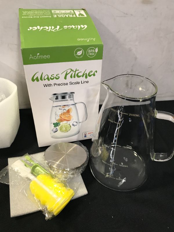 Photo 3 of Glass Pitcher, 68oz Water Pitcher with Lid and Precise Scale Line, 18/8 Stainless Steel Iced Tea Pitcher, Easy Clean Heat Resistant Borosilicate Glass Jug for Juice, Milk, Cold or Hot Beverages
