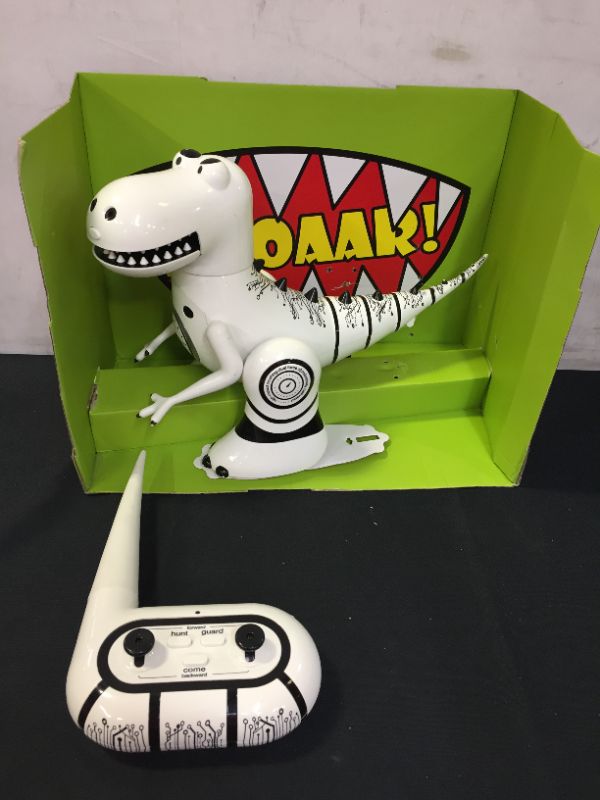 Photo 1 of SHARPER IMAGE Interactive RC Robotosaur Dinosaur with Built-in Mood Sensors and Color-Changing LED Eyes
