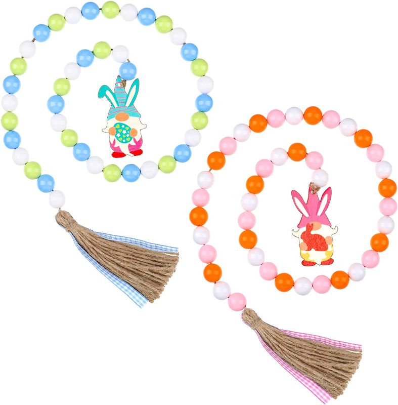 Photo 1 of 2 Pieces Easter Wood Beaded Garland with Tassels Gnome Pendant Wooden Bead Garland Gnome Shape Wooden Embellishments Bead for Easter Party Favors (Chic Color)
