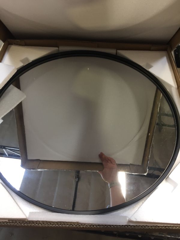 Photo 1 of 24 Inch Round Metal Edge Mirror. Minor Use, Scratches adn SCuffs on edges, Packaging Opened, Missing some Hardware
