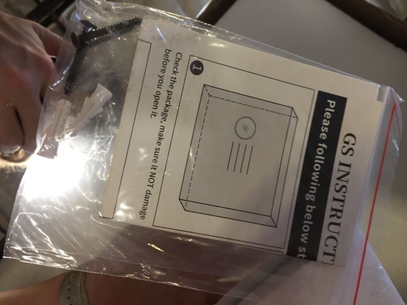 Photo 1 of 24 Inch Round Metal Edge Mirror. Minor Use, Scratches adn SCuffs on edges, Packaging Opened, Missing some Hardware
