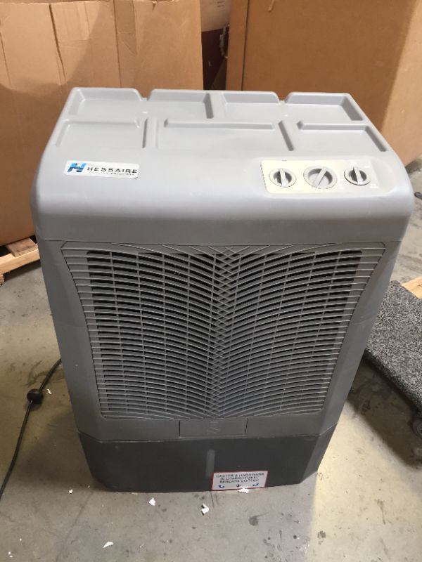 Photo 10 of Hessaire MC37M Evaporative Cooler, 3,100 CFM, Gray,No Box Packaging, Moderate Use, Scratches and Scuffs on item. Plastic Casing Opening Up Near Bottom as Shown in Pictures. Turn on and Blows Airs, Hardware Underneath Item
