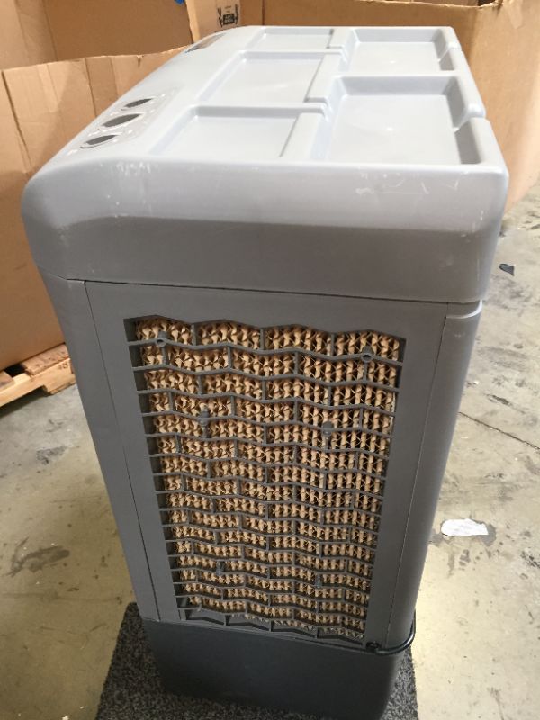 Photo 13 of Hessaire MC37M Evaporative Cooler, 3,100 CFM, Gray,No Box Packaging, Moderate Use, Scratches and Scuffs on item. Plastic Casing Opening Up Near Bottom as Shown in Pictures. Turn on and Blows Airs, Hardware Underneath Item
