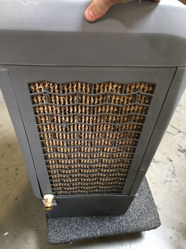 Photo 9 of Hessaire MC37M Evaporative Cooler, 3,100 CFM, Gray,No Box Packaging, Moderate Use, Scratches and Scuffs on item. Plastic Casing Opening Up Near Bottom as Shown in Pictures. Turn on and Blows Airs, Hardware Underneath Item
