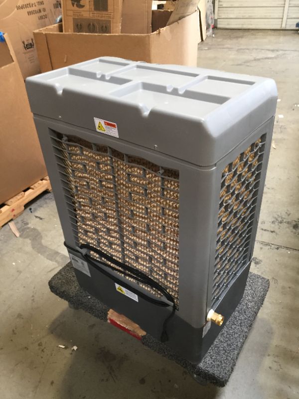 Photo 12 of Hessaire MC37M Evaporative Cooler, 3,100 CFM, Gray,No Box Packaging, Moderate Use, Scratches and Scuffs on item. Plastic Casing Opening Up Near Bottom as Shown in Pictures. Turn on and Blows Airs, Hardware Underneath Item
