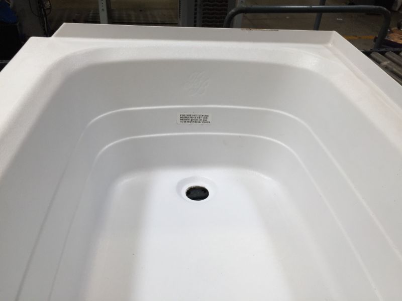 Photo 6 of 24" x 36" RH Drain Tub - White, No Box Packaging, Moderate Use, Scratches and Scuffs on item. 
