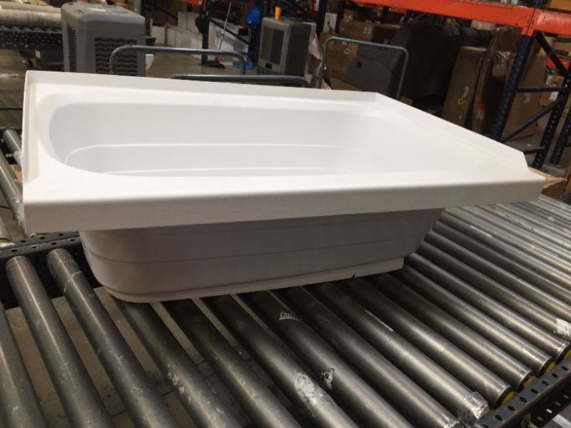 Photo 2 of 24" x 36" RH Drain Tub - White, No Box Packaging, Moderate Use, Scratches and Scuffs on item. 
