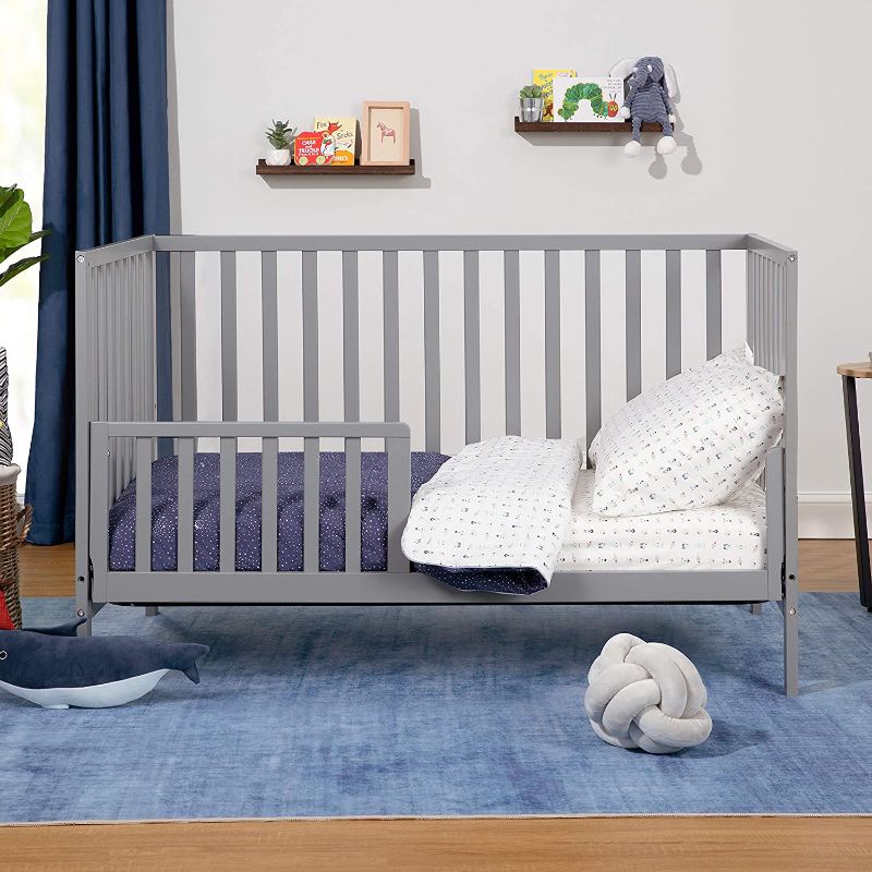 Photo 1 of DaVinci Union 4-in-1 Convertible Crib in Grey, Greenguard Gold Certified ,Box Packaging Damaged, Moderate Use, Scratches and Scuffs Found on item, Hardware Missing. 
